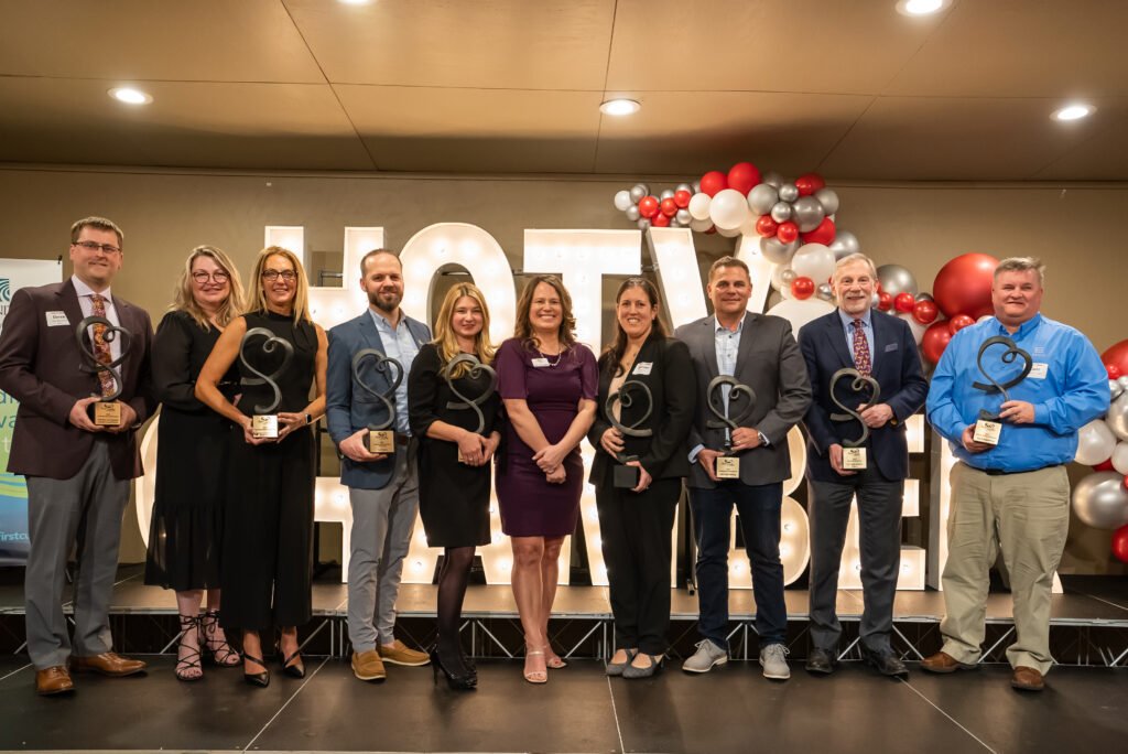 Award winners and attendees at the Heart of the Valley Chamber of Commerce Annual Awards Banquet, captured in joyful moments.